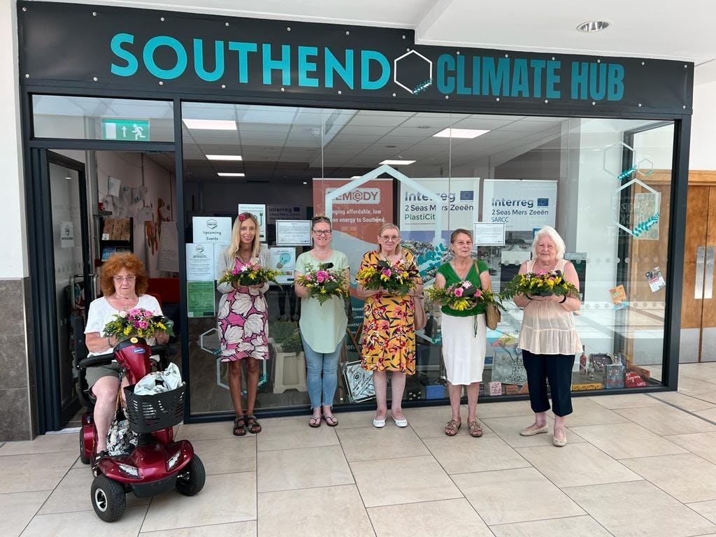 Photo of residents standing outside the hub