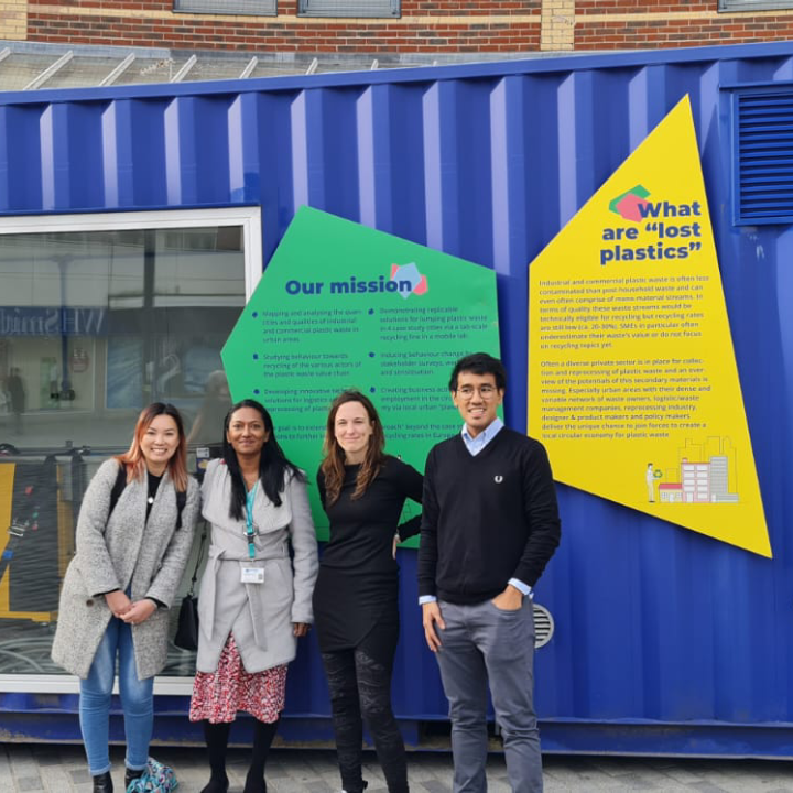 The PlastiCity Team standing in front of the mobile unit.